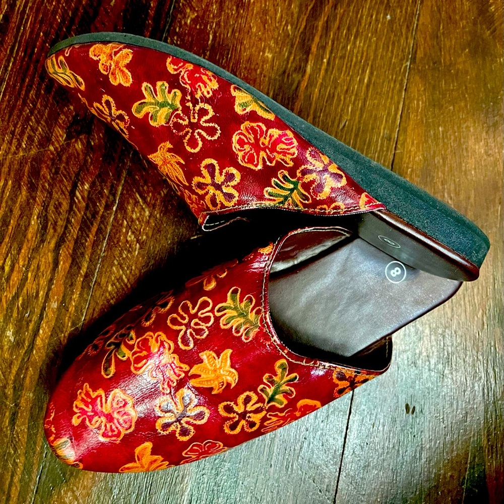 Handmade tooled leather mules  from India. Artistic!